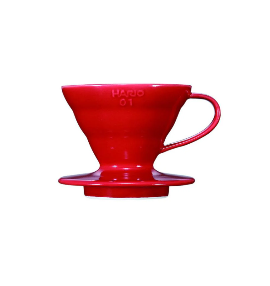 The Hario V60 Ceramic Coffee Dripper - Red (Size 01) is displayed against a white background. This essential pour-over coffee tool features a handle, conical shape, and the Hario brand name etched on its side.