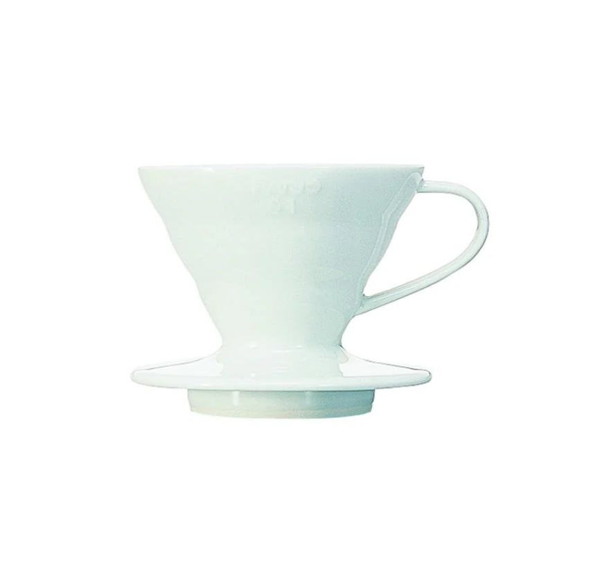 The Hario V60 Ceramic Coffee Dripper - White (Size 01) is a sleek ceramic dripper with a handle, ideal for pour-over brewing, echoing the classic V60 design against a minimalist white backdrop.