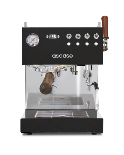 Black Ascaso Steel DUO Plus espresso machine with a wooden-handled portafilter, chrome finish, pressure gauge, PID temperature control, and metal toggle switches.